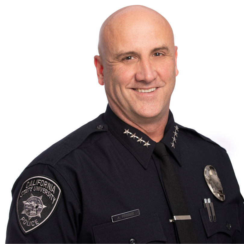 Chief Frisbee in uniform against a white backdrop